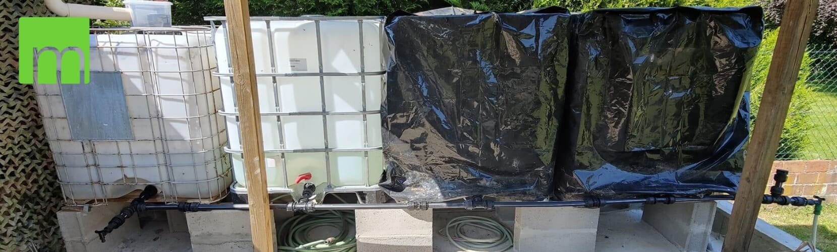 4 cuves de r&eacute;cup&eacute;ration d'eau de pluie install&eacute;e correctement